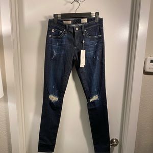 A.G. The Legging Ankle in dark wash with rips. Size 26 NWT never worn retail 235